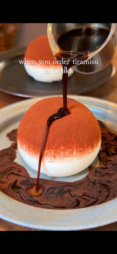 A signature tiramisu “ball” with coffee sauce poured on top in Nakazakicho, Osaka ☕️✨ pognam is famo