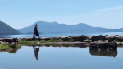 Walking across Lake Toya. Calming and relaxing. The water is crystal clear. love this place. - - #ho
